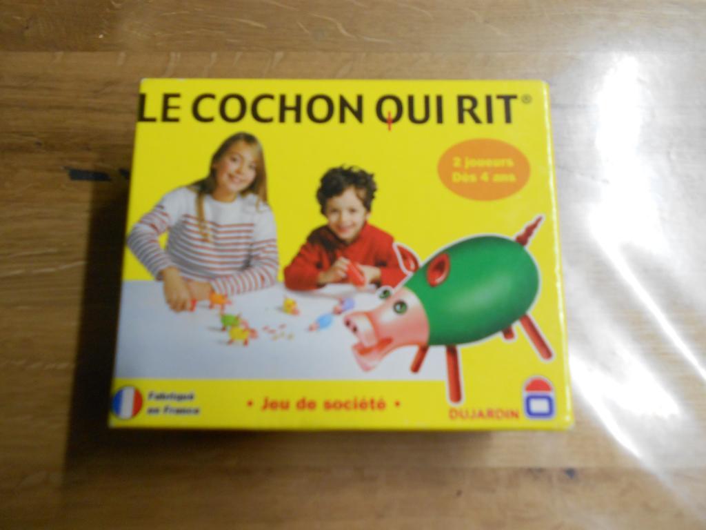 Le Cochon Qui Rit.