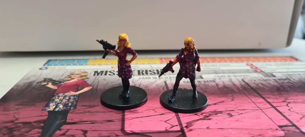 Zombicide - Personnage Miss Trish - Les 2 Figurines + Fiche Personnage Zombicide - Personnage Miss Trish - Les 2 Figurines + Fiche Personnage