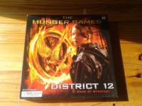 USADO - CAIXA AVARIADA) The Hunger Games: The District 12 - Jogo de  Estratégia (Importado) - Dalaran Games