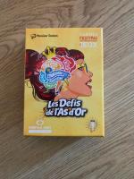 Boîte de Les Défis De L'as D'or