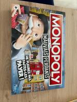 Boîte de Monopoly Mauvais Perdants