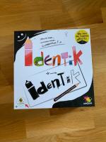 Boîte de Identik