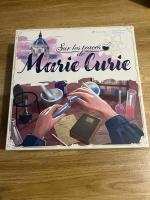 Boîte de Sur Les Traces De Marie Curie