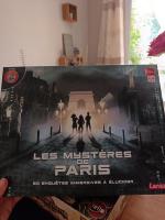 Boîte de Les Mystères De Paris 20 Enquêtes Immersives à élucider