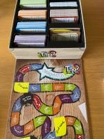 Boîte de TTMC - Tu Te Mets Combien ?